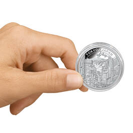 Silver Bullion $2 Coin Collection 10855 0013 d handshot